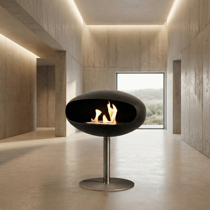 Cheminée Éthanol COCON Essentiel dans un intérieur minimaliste à l’architecture contemporaine.